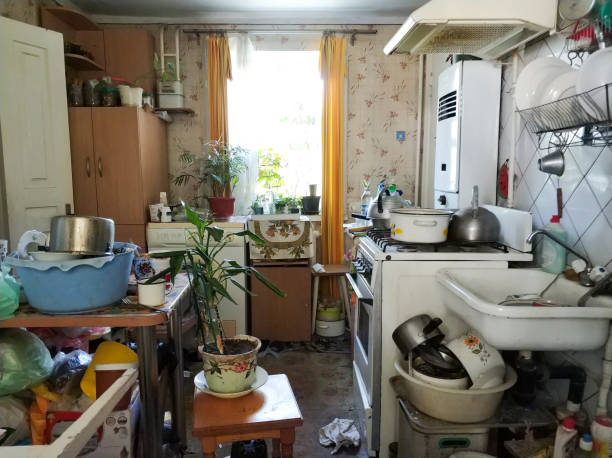 arlington-heights mess and dump. An old room with lots of things. Devastation. Very small housing.
